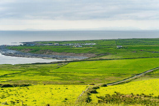Coastal landscape near Doonagore Castle and Doolin, County Clare, Ireland. Scenic Atlantic farmland on the Wild Atlantic Way with views toward the Aran Islands.