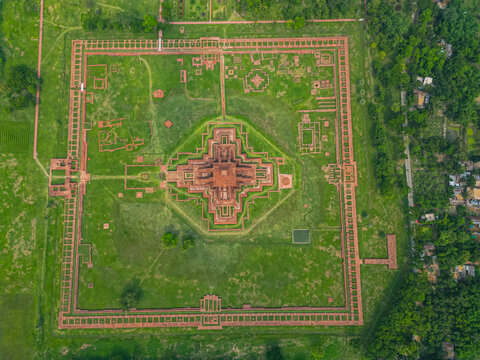 Exploring the large ruins of the Buddhist Vihara at Somapura Mahavihara in Paharpur, Bangladesh