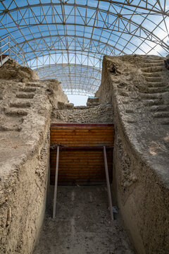 Exploring ancient ruins of Old Gabala with protective structure above the excavation site in Azerbaijan