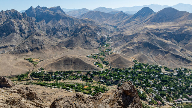 Scenic aerial view of Alinja castle surrounded by mountains and valleys in Nakhchivan region of Azerbaijan on a clear day
