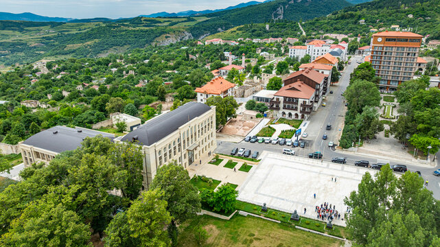Aerial view of Shusha in Qarabaqh region showing buildings, streets, and natural landscape in Azerbaijan