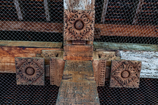 Intricate woodwork at Temple of the Tooth showing craftsmanship and detail in Kandy, Sri Lanka