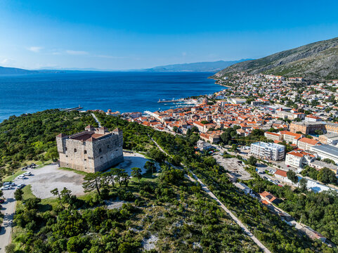 View of Senj Croatia with coastal landscape and historic fort on a clear day