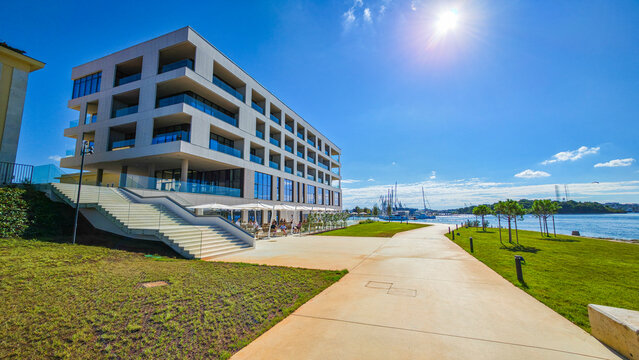 Luxury resort overlooks water on a sunny day in Pula, Istria, Croatia