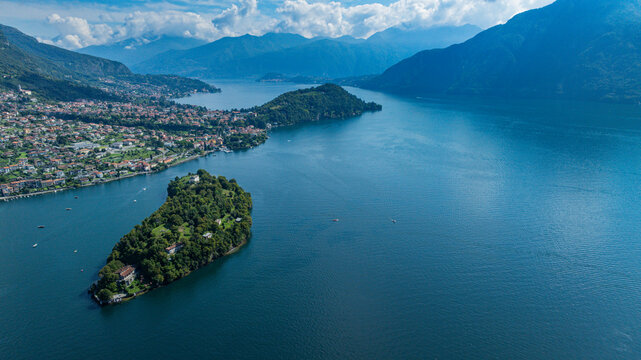 Beautiful aerial view of Comacina island in Lake Como showcasing nature and water activities