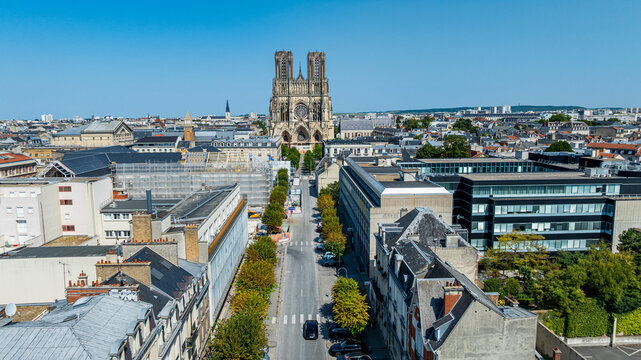 View of Notre Dame cathedral in Reims from above showing surrounding buildings and streets in France