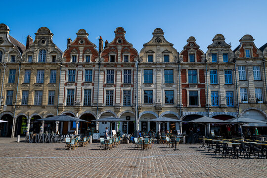 Exploring the Belfries of Arras in France with historic architecture and open seating for visitors