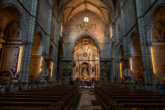 Visit to Bones Chapel in Sao Francisco Church at UNESCO site in Evora Portugal features intricate architecture and historical elements