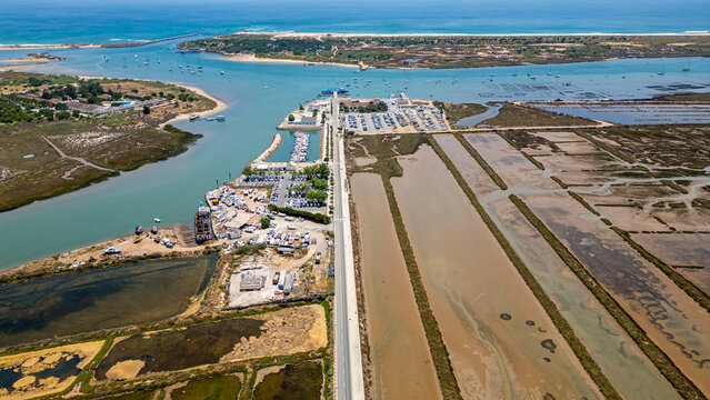 Saltpans and waterways in Tavira region showcase traditional salt harvesting in Algarve, Portugal