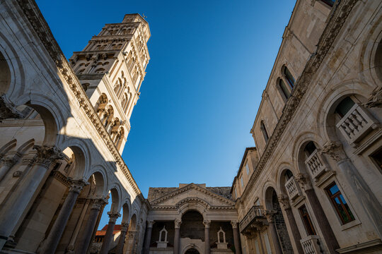 Focus on the bell tower of the Cathedral of Saint Domnius within the historic Diocletians Palace in Split, Croatia