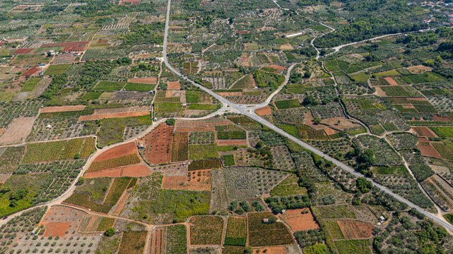 Aerial view showcasing the layout of Stari Grad plain in Hvar, Croatia with agricultural fields and road intersections