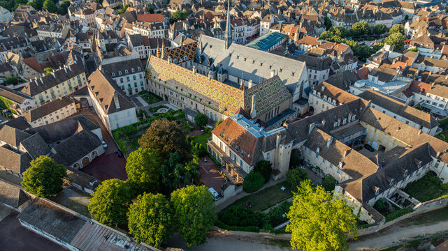View of the Hospices de Beaune with historic buildings in Beaune, France showcasing the unique architecture and layout of the area