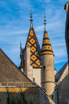Aerial view highlights the rich architecture of Hospices de Beaune showing the distinctive roofs in Burgundy, France