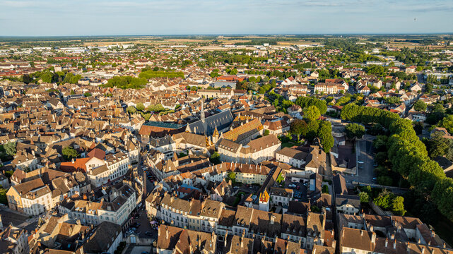 Aerial view reveals Hospices de Beaune in Burgundy, showcasing historic architecture and urban layout of the town