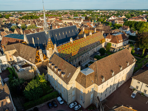 Historic Hospices de Beaune viewed from above in the town of Beaune, Burgundy, France during clear weather
