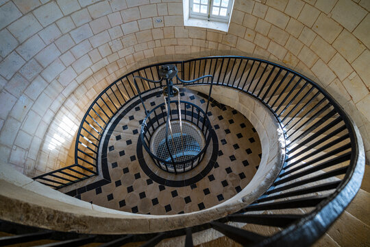 Exploring the stairwell of the lighthouse in Cordouan, France with a view from above