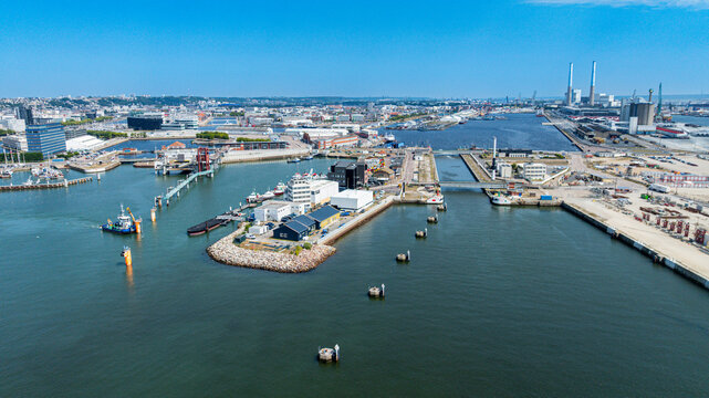 View of Le Havre from above showing port, docks, and industrial areas in Normandy, France during daylight hours