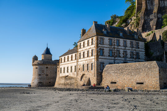 Mont St. Michel showcases historic architecture and coastal scenery in France during clear weather