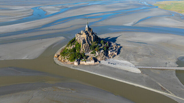 UNESCO site Mont St. Michel shows its unique structure and surrounding tidal flats in France from a high view