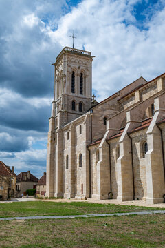 Vezelay Abbey stands tall in the historic hill town amid changing skies in France