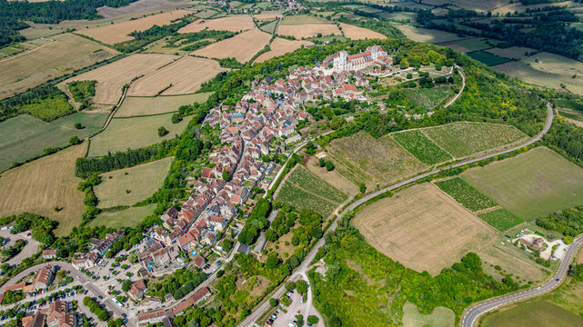 View of Vezelay Abbey and hill town in France captured from above, showcasing historical architecture and surrounding landscape