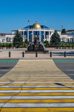 Headquarters of the government building in Magas, light shines on the public square in the capital of Ingushetia, Russia