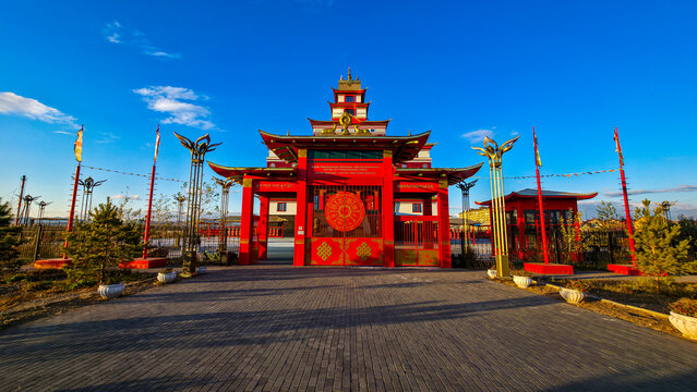 Welcoming gate of Thubten Shedrub Ling monastery in Kyzyl, Tuva, Russia during a sunny day