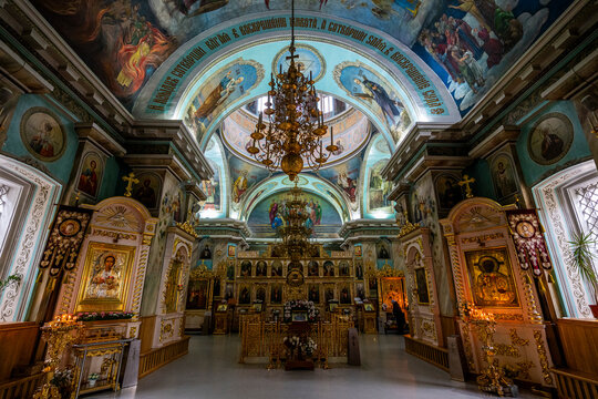Beautiful interior of the Cathedral of St. Peter and St. Paul features ornate decorations and religious symbols in a historic site in Belarus