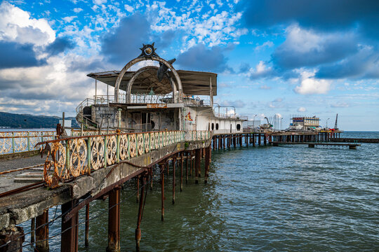 Old casino structure on a pier with ocean view in Sukhumi, Russia