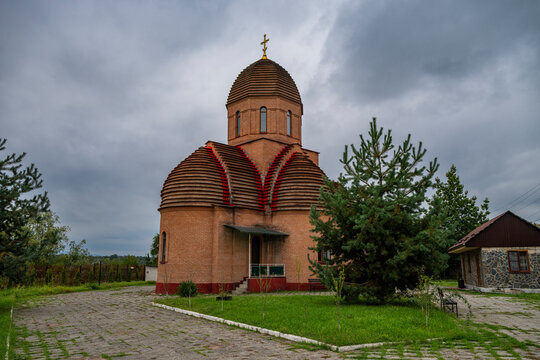 Unique church stands in the Caucasus mountains of North Ossetia, Russia with distinct architecture and surroundings