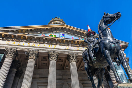 Duke of Wellington statue with traffic cone at Glasgow Museum of Modern Art in Scotland
