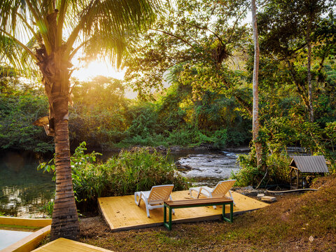 Relaxing at Hostal Oasis The Traveler in Lanquin, where nature meets comfort along the river bank