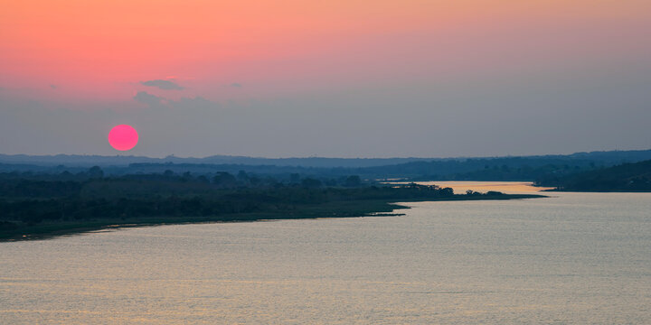 View of sunset over Lake Peten Itza from Mirador Rey Canek in San Miguel Flores, Peten Department Guatemala