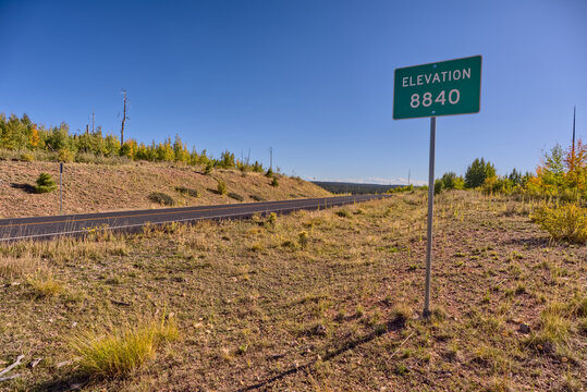 Sign marking the highest point on Kaibab Plateau at 8840 feet elevation in northern Arizona