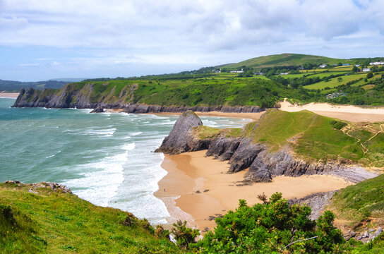 View of Pobbles Bay beach and Three Cliffs Bay on the Gower Peninsula in Swansea, United Kingdom