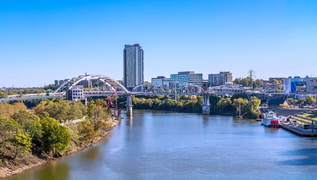 Cumberland River and Korean Veterans Memorial Bridge view with city skyline in Nashville Tennessee