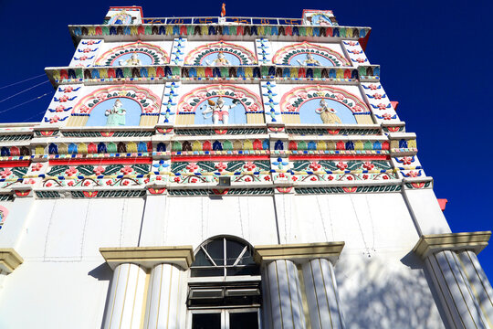 Maheswarnath Mandir Hindu Temple features colorful decorations and carvings in Trou-aux-Biches, Mauritius
