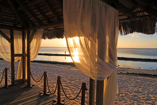 Wedding gazebo at sunset with view of beach at Point aux Piments in Mauritius