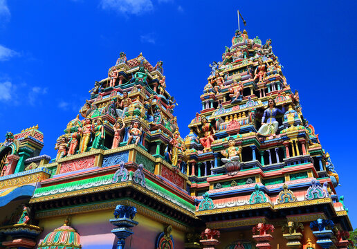 Colorful architectural details of Draupadee Ammen Kovil Hindu Temple in Goodlands showcasing intricate sculptures in Mauritius