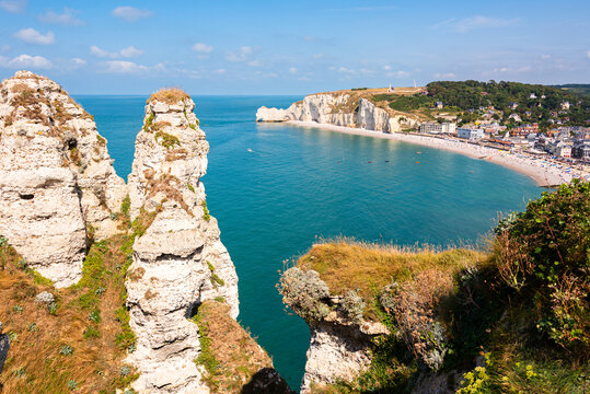 View of the white cliffs and turquoise sea from the clifftop trail on the Alabaster Coast in Normandy, a popular location for visitors and hikers