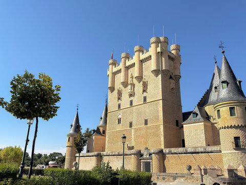 Historic Alcazar in Segovia showcases unique architecture under clear blue sky in Castile and Leon, Spain