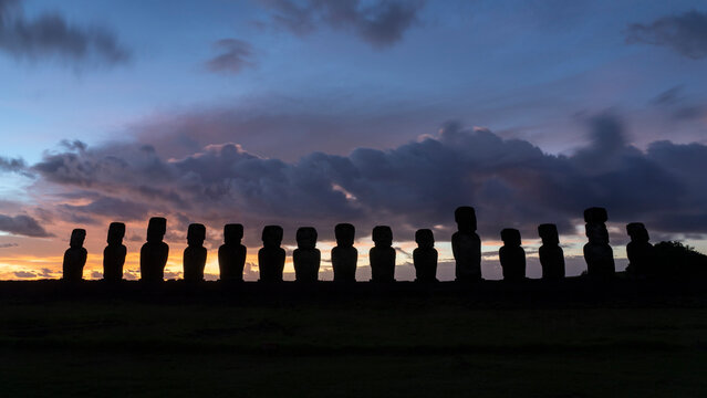 Sunrise at ahu tongariki with moai statues on easter island in chile