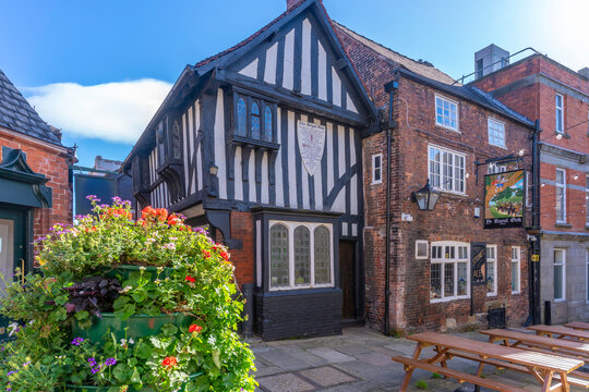Autumn view of Ye Royal Oak public house with colorful flowers in Chesterfield, Derbyshire, in the United Kingdom