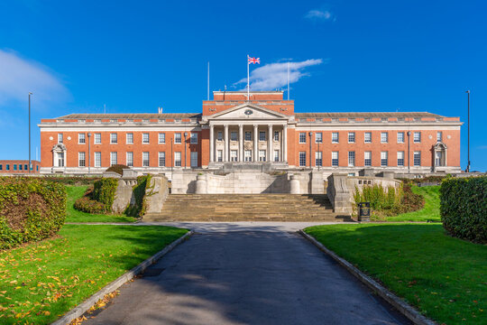 Chesterfield Town Hall stands in autumn with clear skies and vibrant foliage in front of the building in Derbyshire, England, United Kingdom