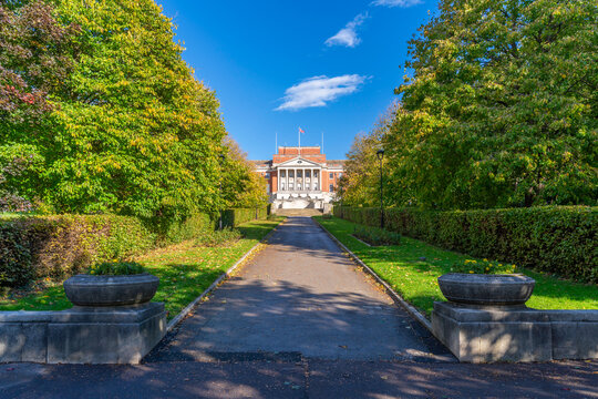 View of Chesterfield Town Hall surrounded by trees and pathways during autumn in Derbyshire, England, United Kingdom