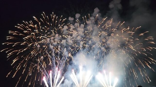 Beautiful Fireworks Display Lighting Up Night Sky With Colorful Explosions