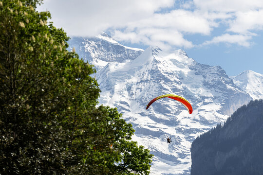 a paraglider in the swiss alps