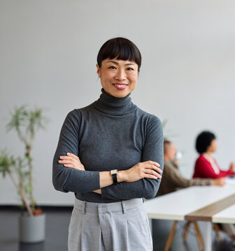 Group of young business people having a meeting or presentation and seminar in the office. Portrait of a young businesswoman