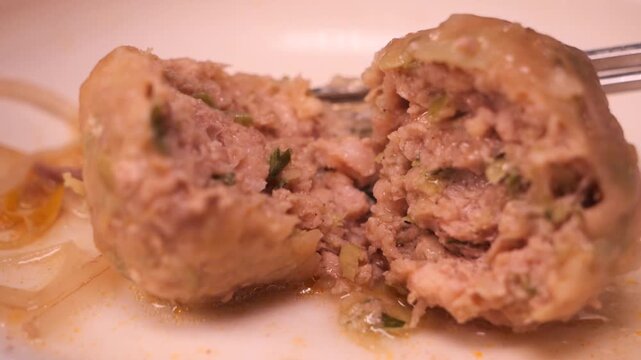 Juicy rolled dumplings on plate