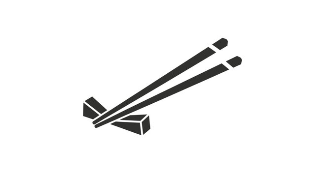 Minimalist black chopsticks resting on a chopstick rest